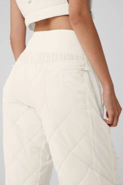 High-Waist Snowrider Puffer Pant - Ivory 10 High-Waist Snowrider Puffer Pant - Ivory -Alo Yoga Shop W51351R 03299 b1 s1 a4 1 m54